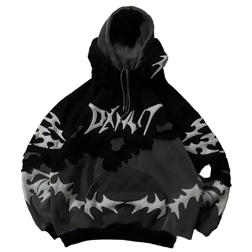 Black hoodie with white designs and text on a textured gray surface